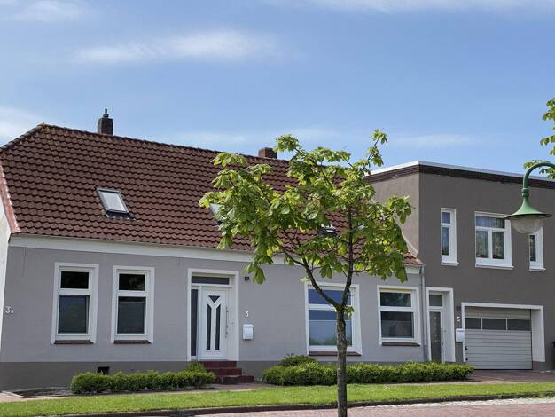 Mehrfamilienhaus zum Kauf provisionsfrei 375.000 € 11 Zimmer 206 m² 320 m² Grundstück Lange Straße 3 Hooksiel Wangerland 26434