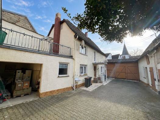 Einfamilienhaus zum Kauf 399.000 € 5 Zimmer 123,5 m² 667 m² Grundstück Massenheim Hochheim 65239
