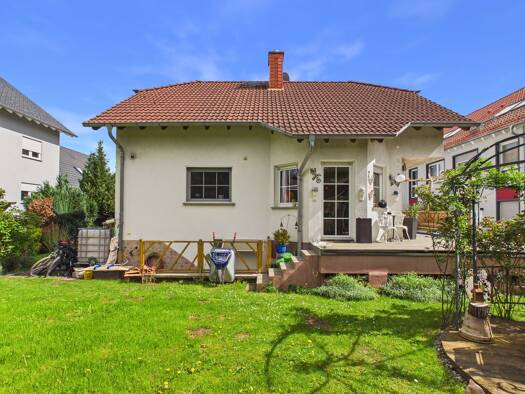 Einfamilienhaus zum Kauf 449.000 € 5 Zimmer 129,4 m² 869 m² Grundstück Nieder-Wöllstadt Wöllstadt 61206