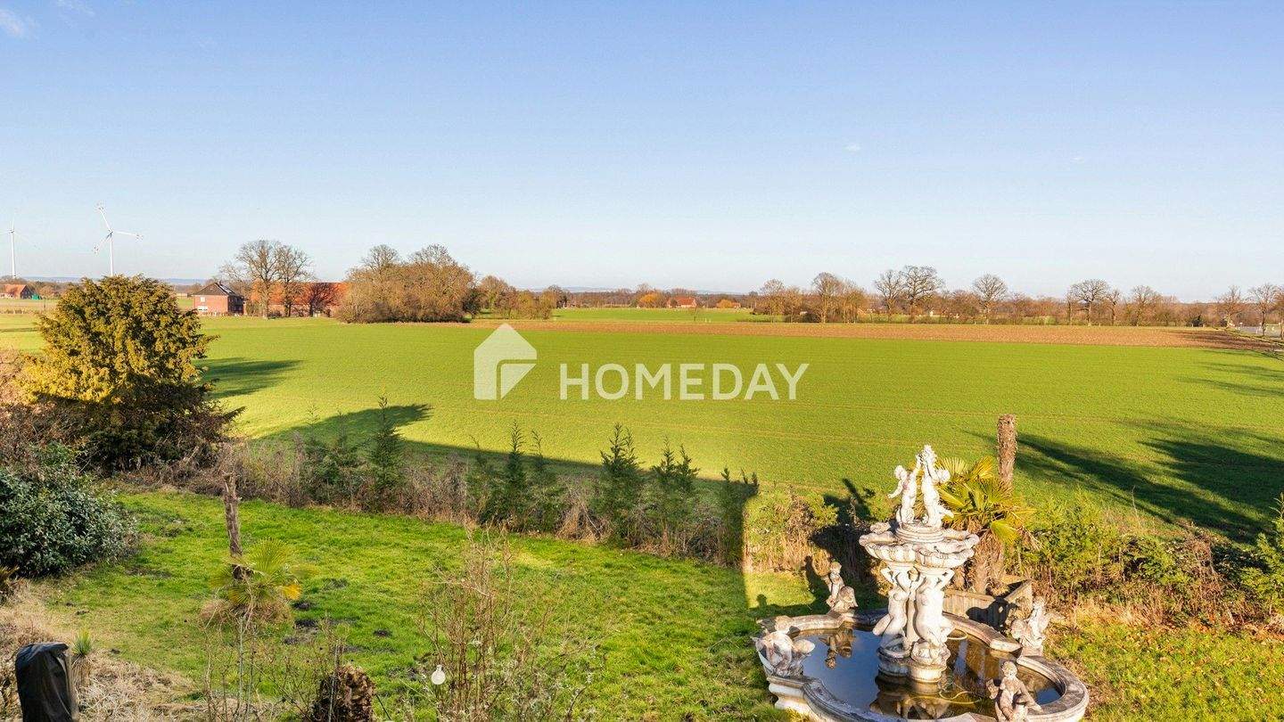 Immobilie in Ennigerloh - Großzügiges Einfamilienhaus mit Indoor-Pool, Einliegerwohnung und parkähnlichem Grundstück - Bild 2