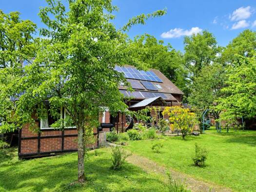 Mehrfamilienhaus zum Kauf 469.000 € 9 Zimmer 300 m² 2.394 m² Grundstück frei ab 01.10.2026 Hüllstede Westerstede 26655
