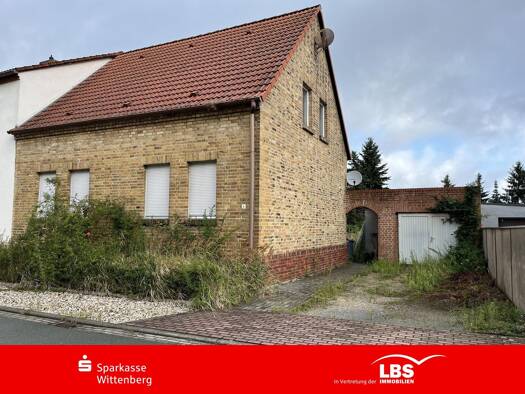 Doppelhaushälfte zum Kauf 49.000 € 4 Zimmer 100 m² 800 m² Grundstück Gröbern Muldestausee 06774