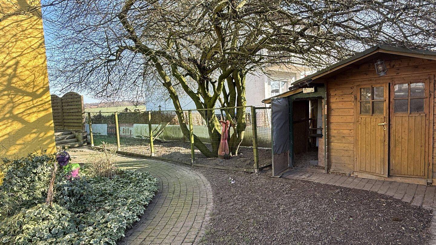 Immobilie in Lippetal - Großzügiges Einfamilienhaus mit Einliegerwohnung und Wintergarten in ruhiger Lage - Bild 1