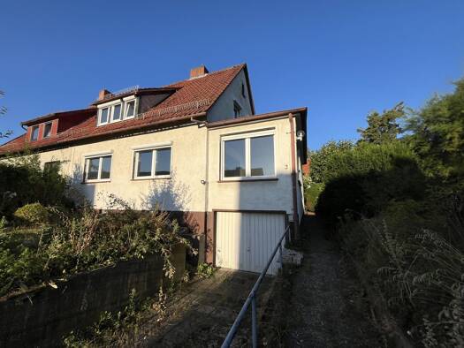Doppelhaushälfte zum Kauf 199.000 € 6 Zimmer 123 m² 693 m² Grundstück Ostlandstraße 3 Nörten-Hardenberg Nörten-Hardenberg 37176