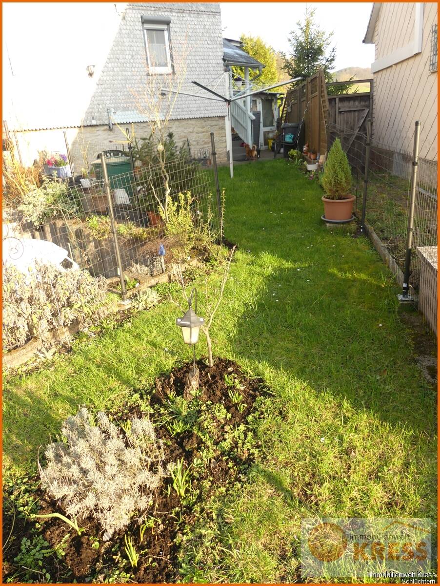 Immobilie in Schlüchtern - DHH mit kleinem Garten, zwei PKW-Stellplätzen, sonnigem Balkon und ruhiger Lage in Elm. - Bild 4