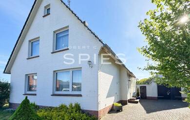 Einfamilienhaus zum Kauf 285.000 € 7 Zimmer 120 m² 1.059 m² Grundstück Wüsting/Wraggenort Wüsting 27798