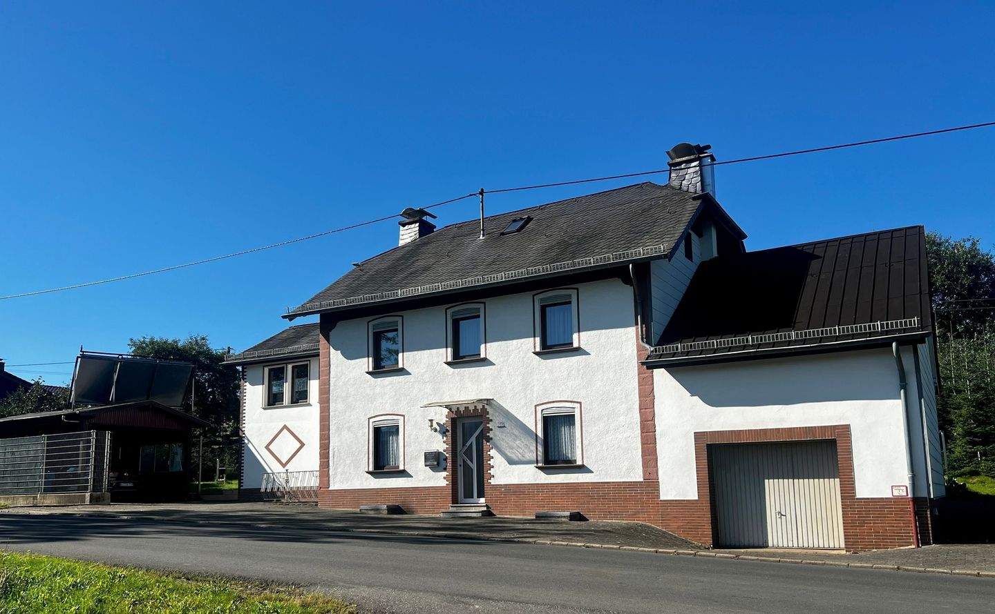 Immobilie in Üttfeld - Gepflegtes Einfamilienhaus mit Nebengebäude und großem Grundstück in idyllischer Lage - Bild 3