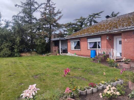 Einfamilienhaus zum Kauf 195.000 € 6 Zimmer 152 m² 2.638 m² Grundstück Königacker 5 Ladelund 25926