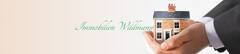 Immobilien Wildmann logo