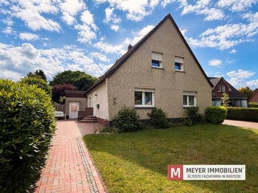 Mehrfamilienhaus zum Kauf 300.000 € 6 Zimmer 157 m² 1.125 m² Grundstück Nuttel Wiefelstede 26215