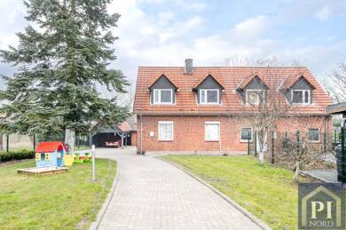 Mehrfamilienhaus zum Kauf provisionsfrei als Kapitalanlage geeignet 695.000 € 10 Zimmer 186,7 m² 1.169 m² Grundstück teilbar ab 186,7 m² Warnau 24250