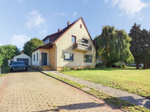 Einfamilienhaus zum Kauf 329.000 € 7 Zimmer 151,8 m² 1.266 m² Grundstück Tarmstedt 27412