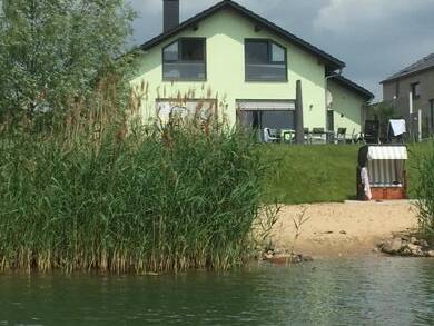 Einfamilienhaus zur Miete 2.950 € 5 Zimmer 165 m² 800 m² Grundstück frei ab 01.10.2025 Am Mühlfeldsee Löbnitz Löbnitz 04509