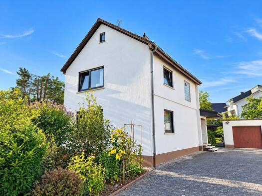 Einfamilienhaus zum Kauf 395.000 € 4 Zimmer 94 m² 827 m² Grundstück Urberach Rödermark 63322