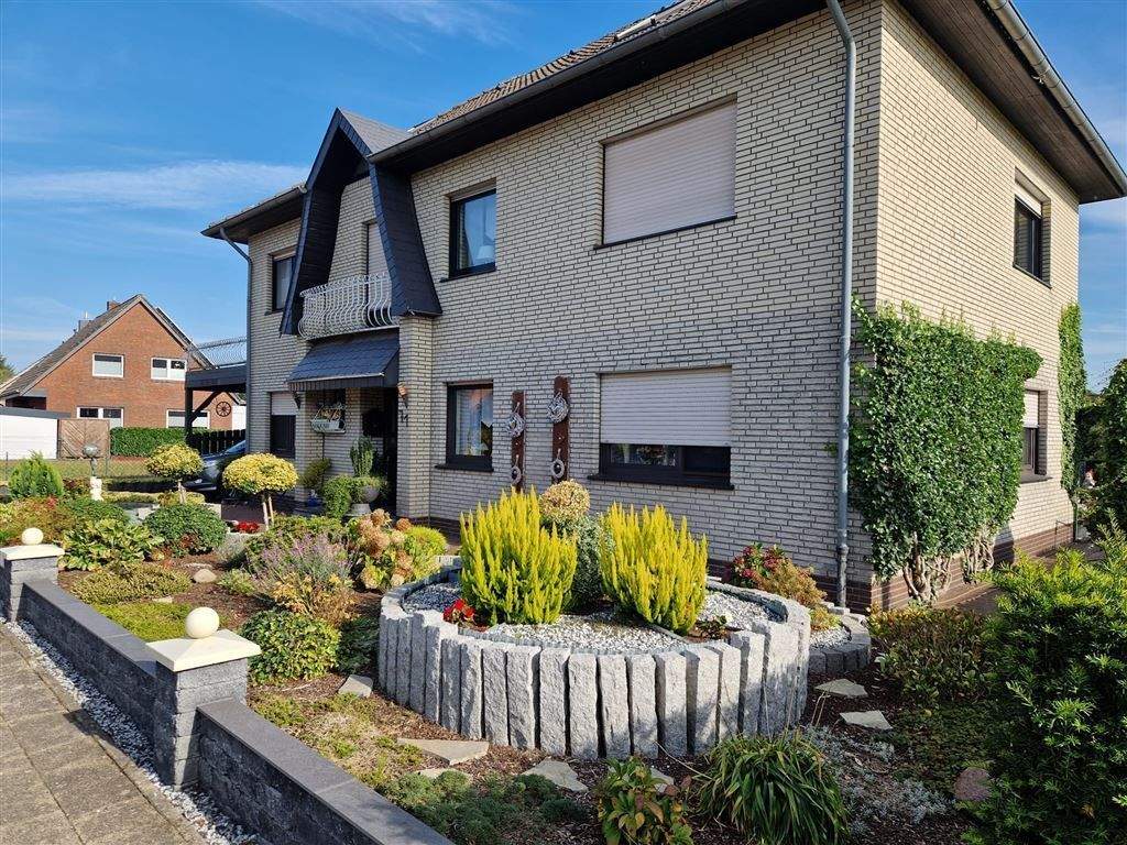 Immobilie in Esterwegen - 2-FH m. Garage - sehr gepflegt in zentrumsnaher ruhiger Lage - Bild 1