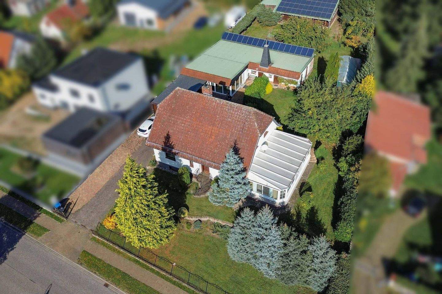 Immobilie in Groß Pankow (Prignitz) - Platzgigant mit besonderen Highlights: 8-Zi.-EFH mit ELW, ausgebautem Nebengebäude, Pool uvm. - Bild 2