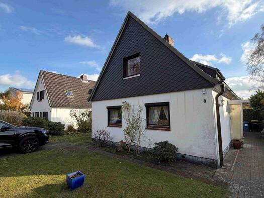 Einfamilienhaus zum Kauf 280.000 € 4 Zimmer 90 m² 717 m² Grundstück Uetersen 25436