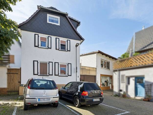 Einfamilienhaus zum Kauf 379.000 € 7 Zimmer 253 m² 539 m² Grundstück Bellersheim Hungen 35410