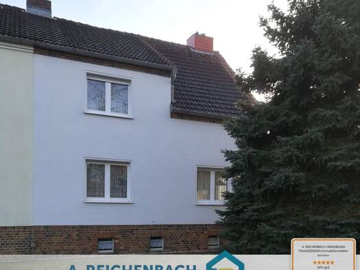 Doppelhaushälfte zum Kauf 179.000 € 6 Zimmer 111 m² 641 m² Grundstück frei ab sofort Straße d. OdF 40 Plodda Muldestausee 06774