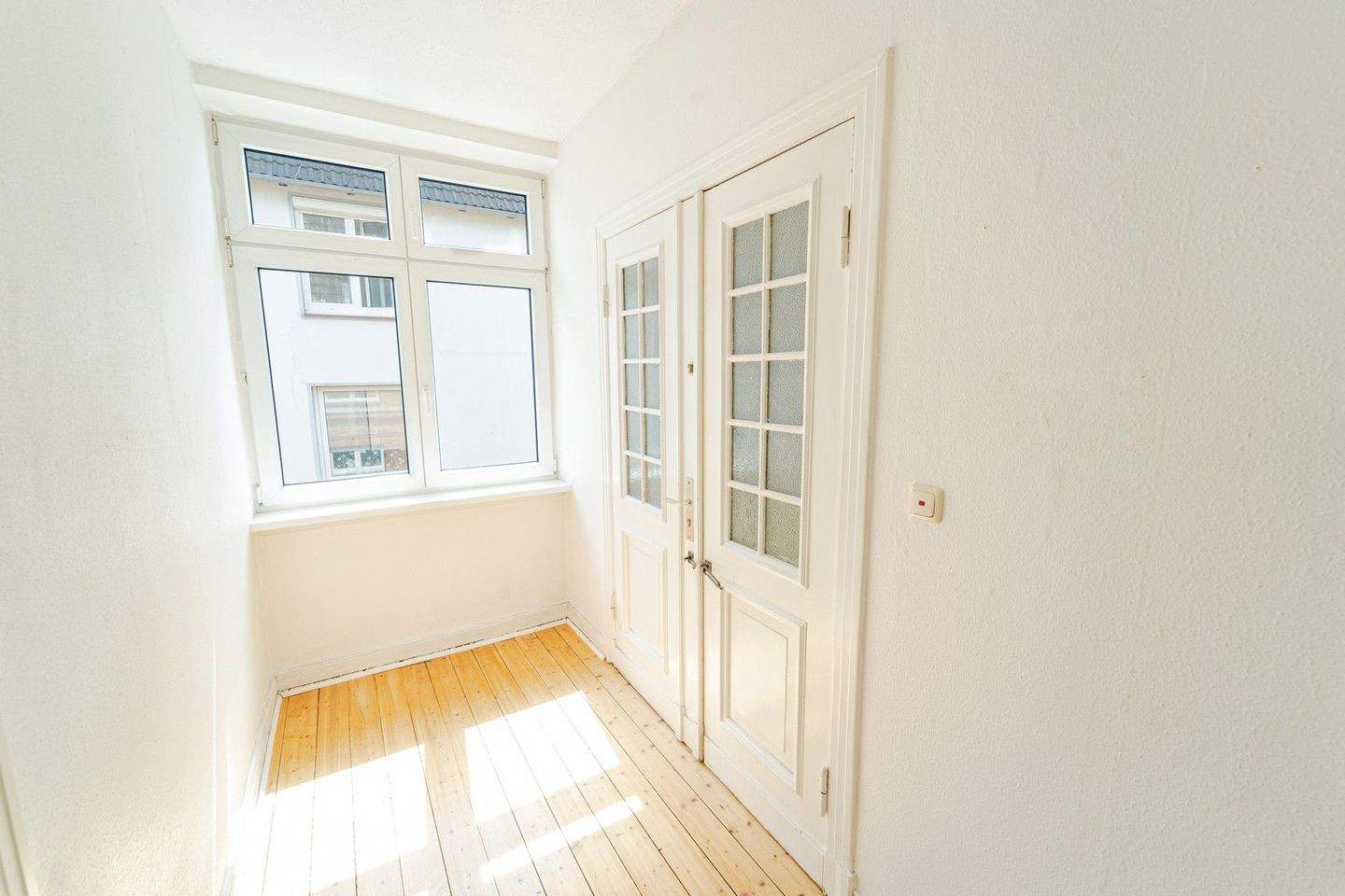 Zauberhafte Altbauwohnung mit Balkon und Gartennutzung im Herzen Lübecks