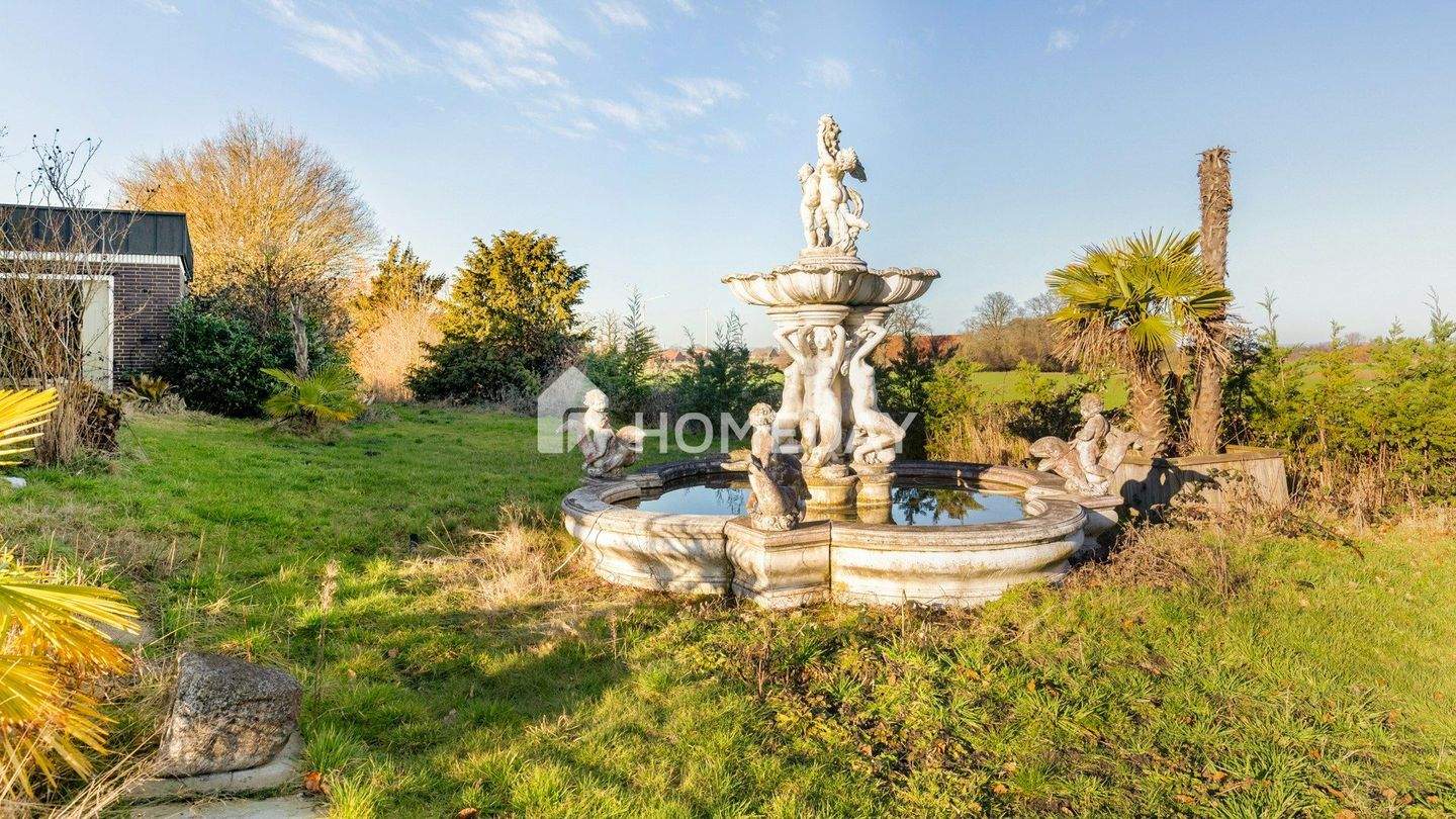 Immobilie in Ennigerloh - Großzügiges Einfamilienhaus mit Indoor-Pool, Einliegerwohnung und parkähnlichem Grundstück - Bild 4