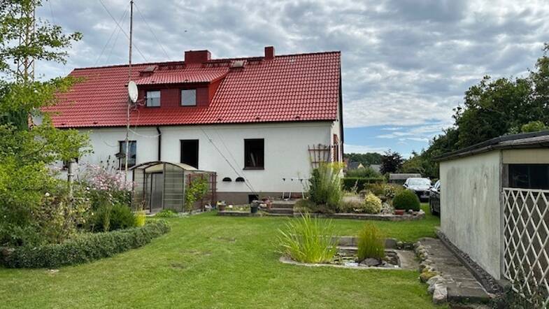 Doppelhaushälfte zum Kauf 99.000 € 4 Zimmer 87 m² 625 m² Grundstück Schulstraße 5 Züssow Züssow 17495