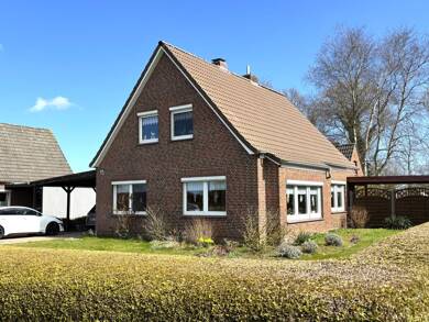 Einfamilienhaus zum Kauf 259.000 € 5 Zimmer 125 m² 1.035 m² Grundstück Burhafe Wittmund 26409