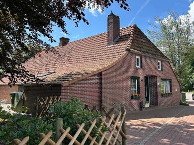 Haus zum Kauf als Kapitalanlage geeignet 225.000 € 5 Zimmer 135 m² 1.153 m² Grundstück Burhave Butjadingen 26969