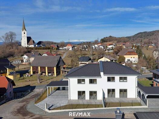 Doppelhaushälfte zum Kauf - Erstbezug 4 Zimmer 131 m² 502 m² Grundstück Maria Saal 9063