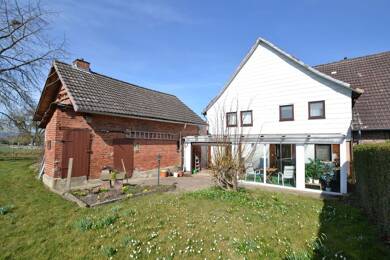 Einfamilienhaus zum Kauf 74.900 € 7 Zimmer 157 m² 1.860 m² Grundstück Schmiedeweg 4 Holzen Holzen 37632