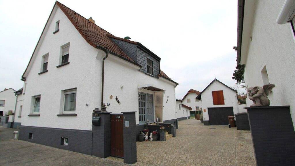 Mehrfamilienhaus zum Kauf 515.000 € 8 Zimmer 164 m² 628 m² Grundstück Biebesheim am Rhein 64584