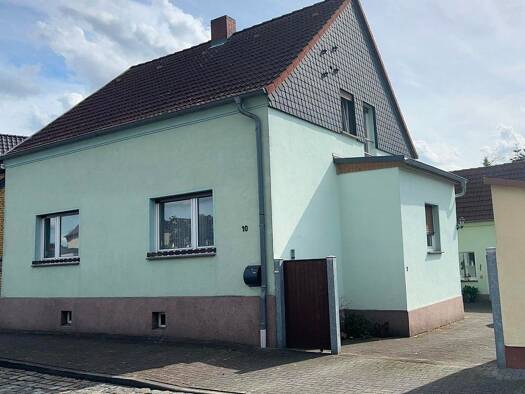 Einfamilienhaus zum Kauf 147.000 € 5 Zimmer 118 m² 539 m² Grundstück Krina Muldestausee 06774