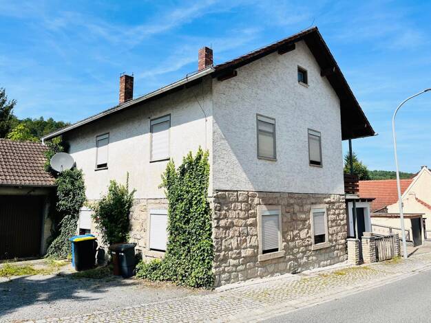 Einfamilienhaus zum Kauf 149.000 € 7 Zimmer 160 m² 1.480 m² Grundstück Unterschleichach Oberaurach 97514