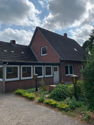 Mehrfamilienhaus zum Kauf 265.000 € 6 Zimmer 123 m² 945 m² Grundstück frei ab sofort Klein Scharrel Edewecht 26188