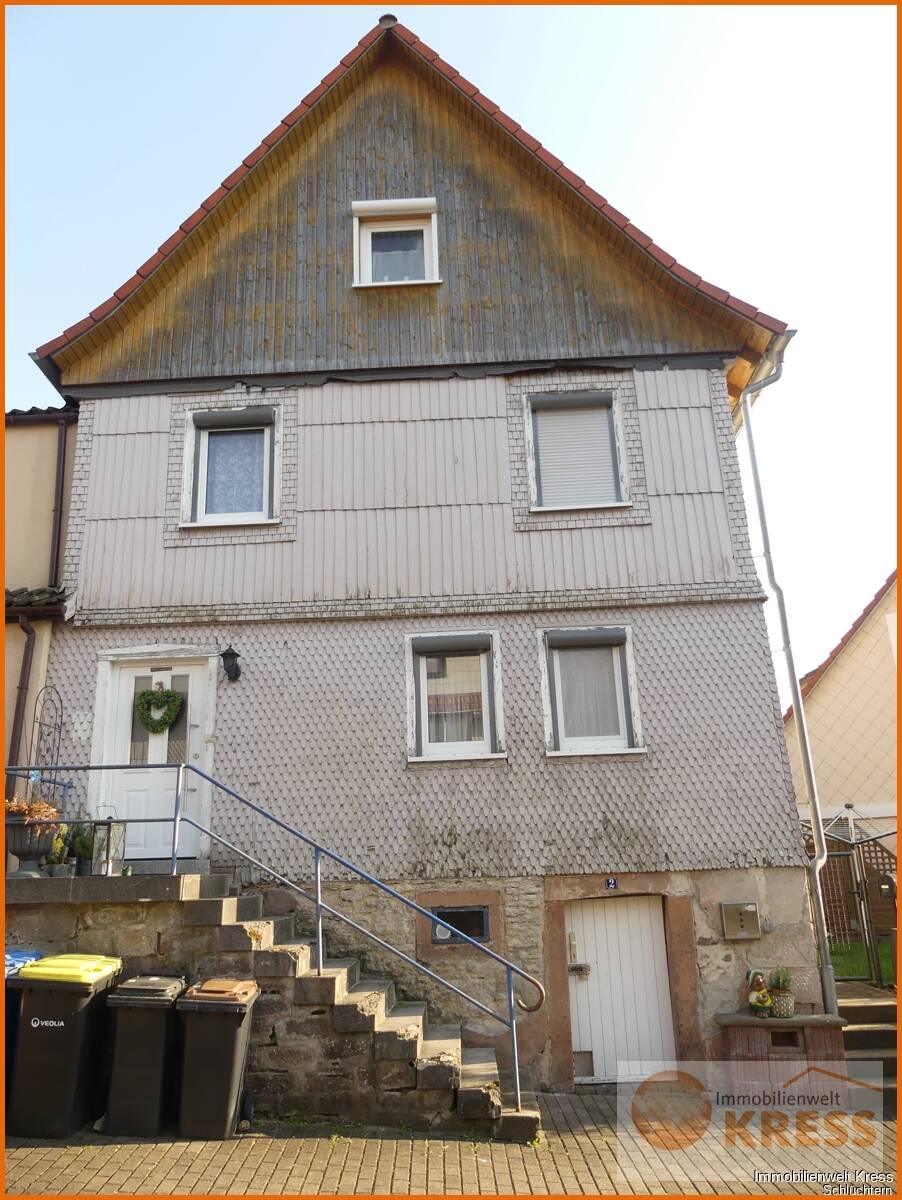 Immobilie in Schlüchtern - DHH mit kleinem Garten, zwei PKW-Stellplätzen, sonnigem Balkon und ruhiger Lage in Elm. - Bild 2