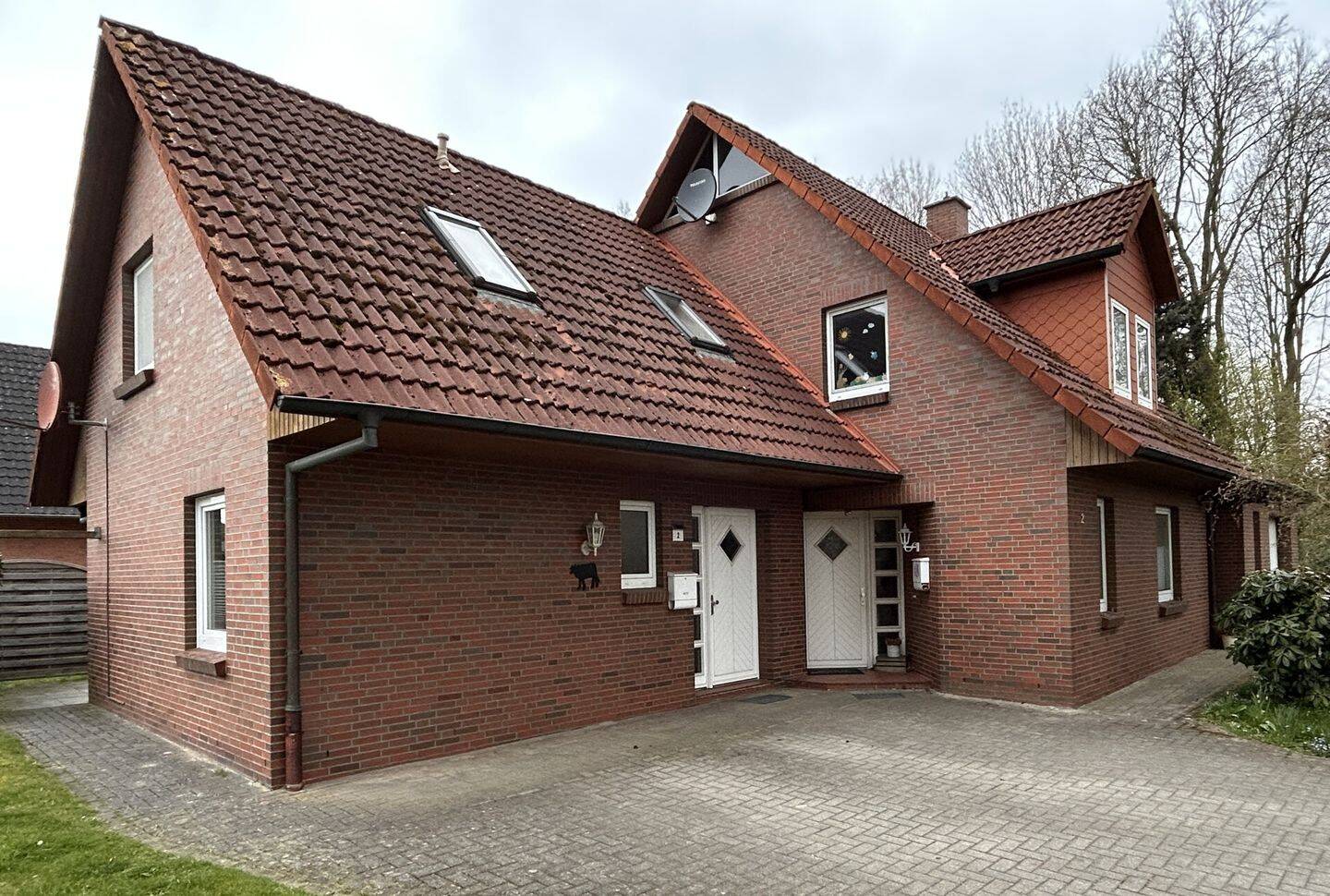 Immobilie in Großenkneten - gepflegtes und vermietetes Zweifamilienhaus in ruhiger naturnaher Lage von Großenkneten - Bild 0