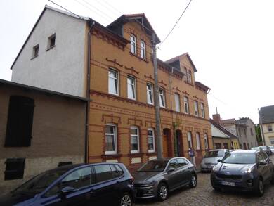 Mehrfamilienhaus zum Kauf 119.999 € 142,2 m² 162 m² Grundstück Wallstr. 7 Zörbig Zörbig 06780