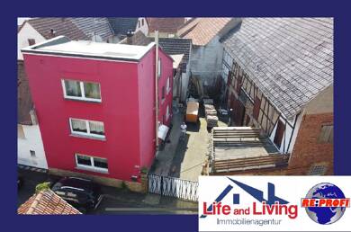 Einfamilienhaus zum Kauf 215.000 € 7 Zimmer 214 m² 398 m² Grundstück Am Weiher 2 Birklar Lich 35423