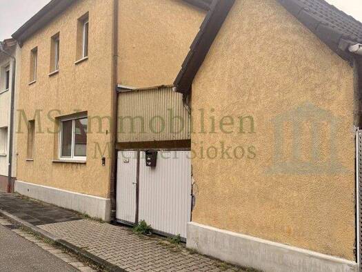 Mehrfamilienhaus zum Kauf 339.000 € 5 Zimmer 137 m² 341 m² Grundstück Hofheim Lampertheim-Hofheim 68623
