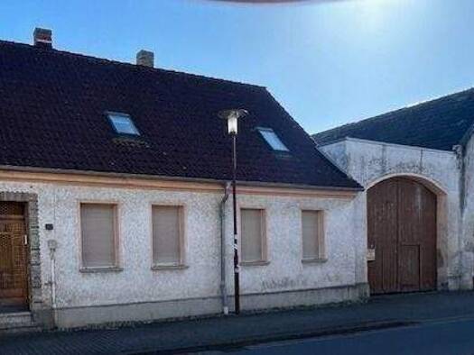Reihenmittelhaus zum Kauf 15.500 € 6 Zimmer 280 m² 1.073 m² Grundstück frei ab sofort Grüne Straße 27 Lindau Zerbst/Anhalt 39264
