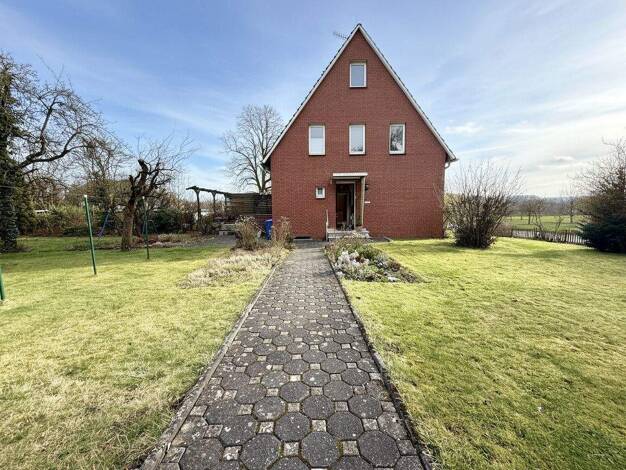 Doppelhaushälfte zum Kauf 319.000 € 5 Zimmer 112 m² 862 m² Grundstück Sutthausen Osnabrück 49082