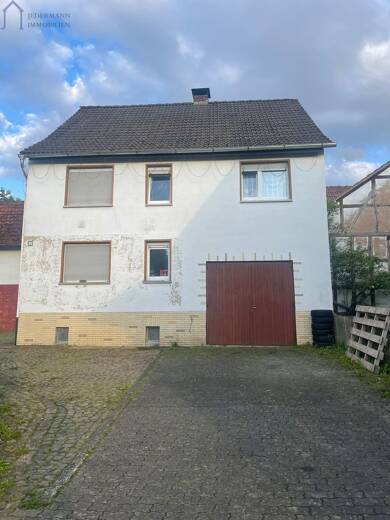 Einfamilienhaus zum Kauf 196.400 € 7 Zimmer 136 m² 933,4 m² Grundstück Rohrbach Ludwigsau 36251