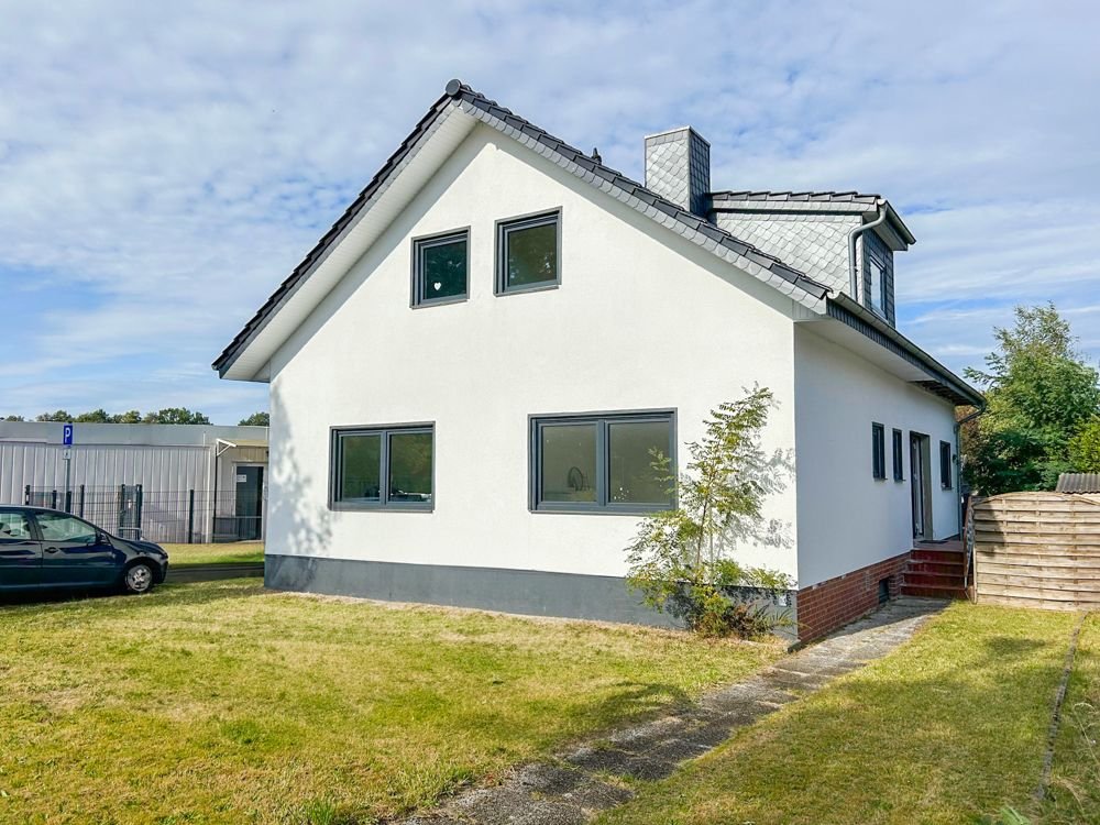 Einfamilienhaus zum Kauf 389.000 € 7 Zimmer 145,1 m²<br/>Wohnfläche 630 m²<br/>Grundstück Neuenkirchen Schwanewede 28790