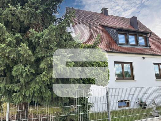 Einfamilienhaus zum Kauf 690.000 € 7 Zimmer 122 m² 702 m² Grundstück Herzogenaurach Herzogenaurach 91074