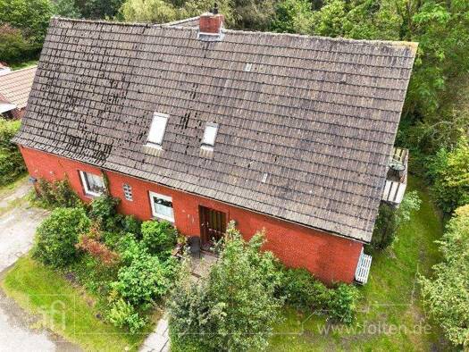 Einfamilienhaus zum Kauf 139.500 € 9 Zimmer 145 m² 1.895 m² Grundstück Veenhusen Moormerland 26802