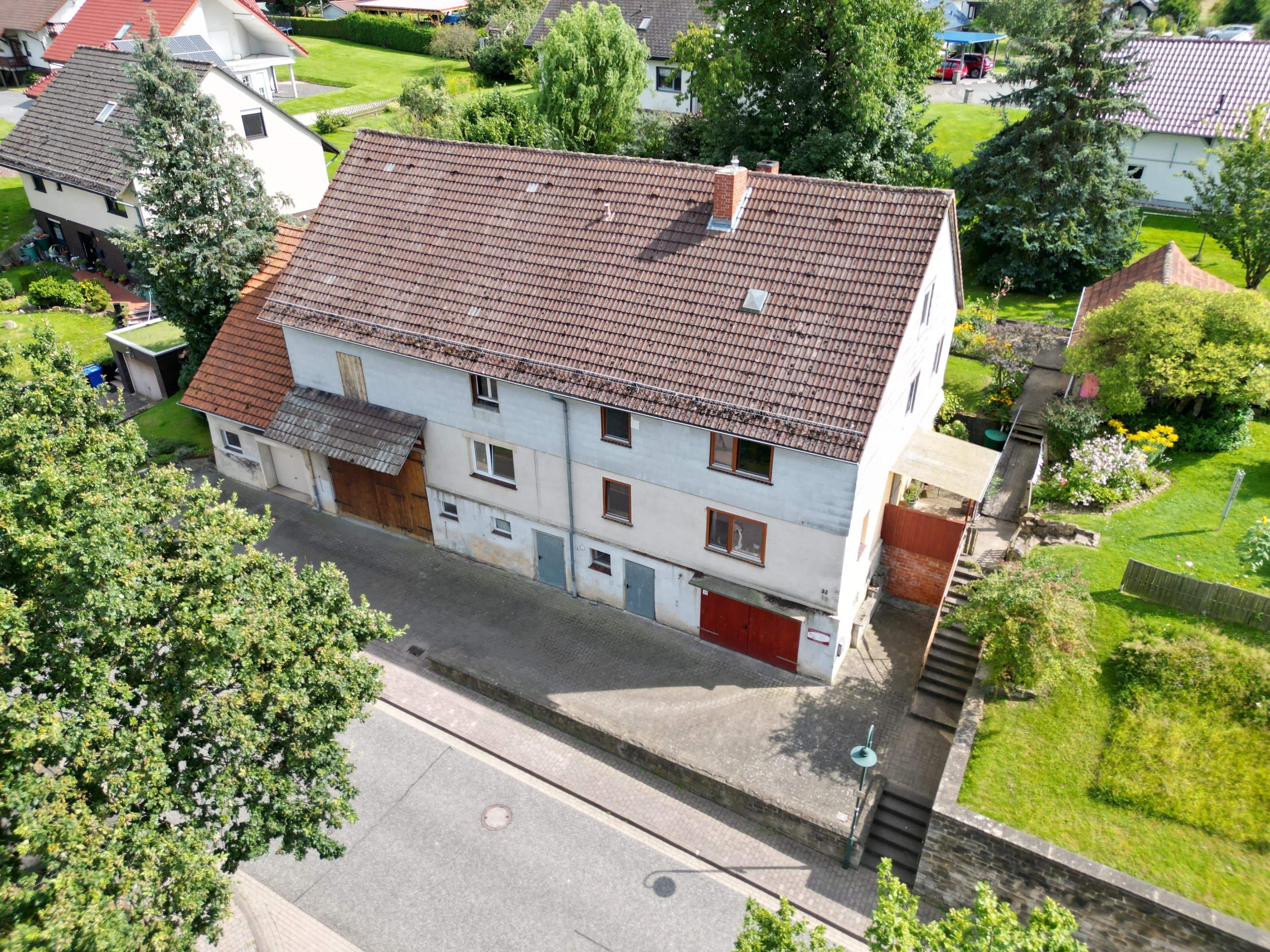 Einfamilienhaus zum Kauf 199.000 € 6 Zimmer 190 m²<br/>Wohnfläche 1.940 m²<br/>Grundstück Wollrode Guxhagen 34302