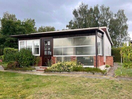 Haus zum Kauf 94.500 € 2 Zimmer 32 m² 433 m² Grundstück Oldenstorf Lohmen 18276