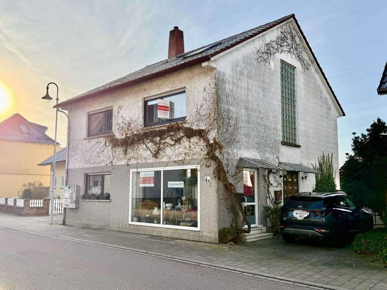 Immobilie in St. Leon-Rot - Vielseitiges 1-2 Familienhaus mit schönem Garten, großer Garage und Gewerbeinheit - Bild 1