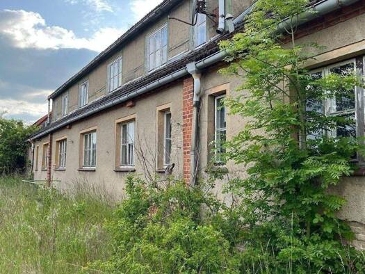 Mehrfamilienhaus zum Kauf 129.000 € 450 m² 1.265 m² Grundstück frei ab sofort Groß Niendorf Zölkow 19374