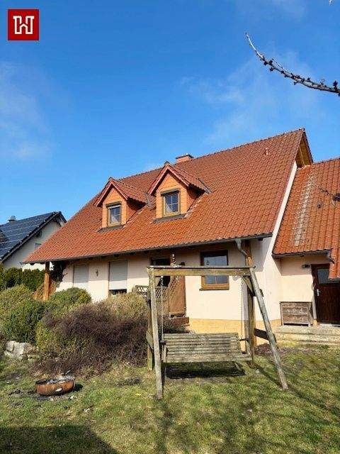 Immobilie in Pfarrweisach - Freistehendes Einfamilienhaus mit großer Doppelgarage und Blick ins Grüne ! - Bild 0